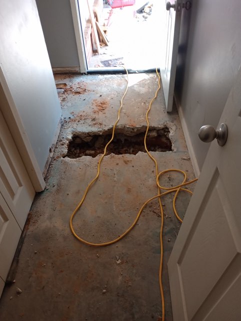 water leak under house slab repair